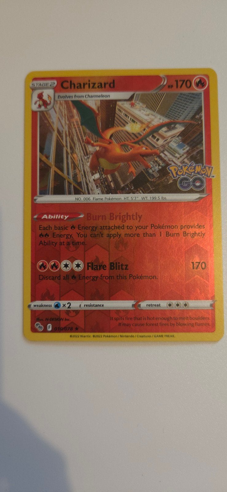 Charizard reverse Holo 010/078, Ophalen of Verzenden, Zo goed als nieuw