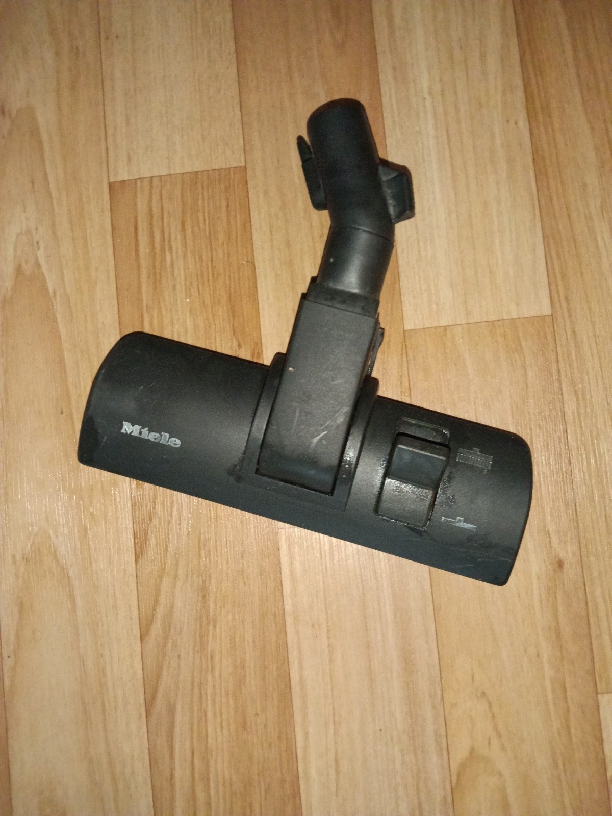 miele slang en voetstuk, Ophalen