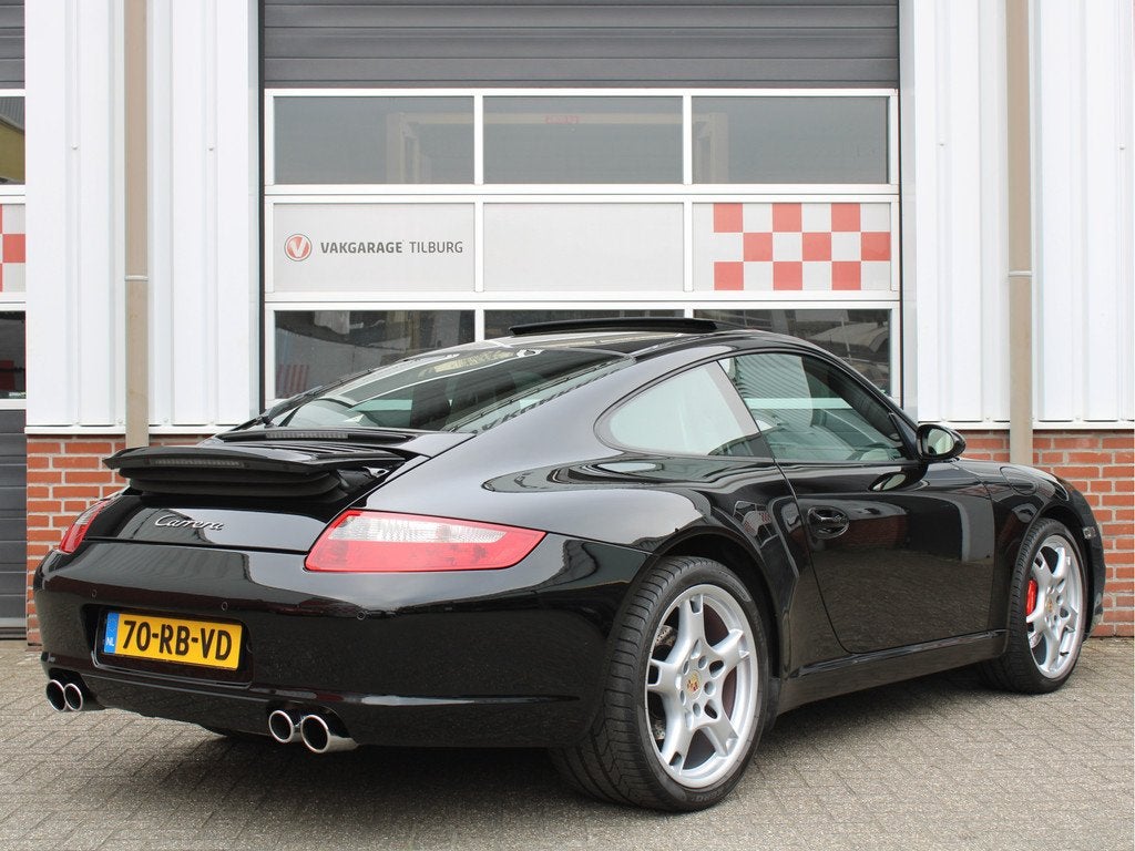 Porsche 911 3.6 Carrera 325PK NL AUTO/Climate/Cruise control, Auto's, Automaat, Achterwielaandrijving, Zwart, 4 stoelen