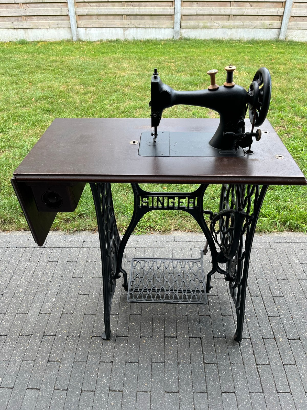 Antieke Singer Naaimachine, Ophalen