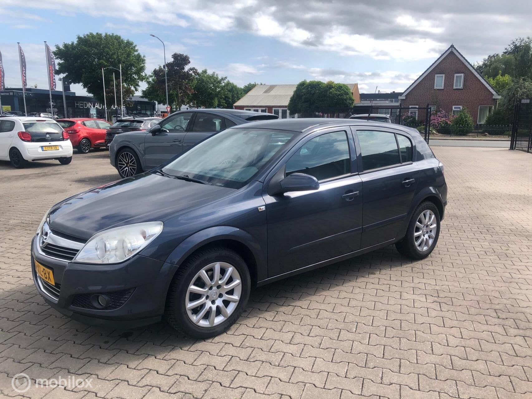 Opel Astra 1.6 Temptation Airco Cruise Trh Lmv, Voorwielaandrijving, 15 km/l, 4 cilinders, 635 kg