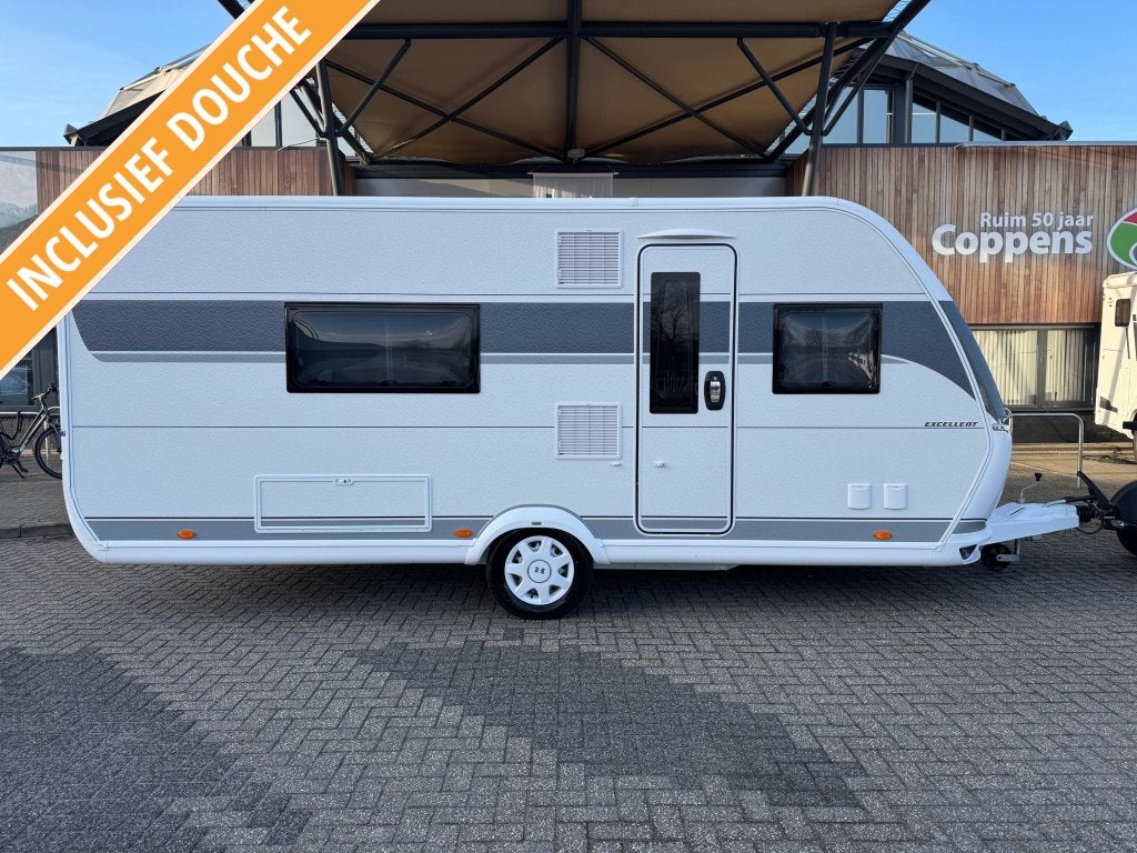 Hobby Excellent 495 WFB 2026 MEGA KORTING € 2695,-!, Caravans en Kamperen, Schokbreker, Bedrijf, Treinzit, 4 tot 5 meter