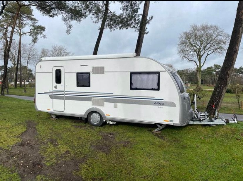 Caravan merk Adria Altea 542PK, Silver Collection., Luifel, Vast bed, 7 tot 8 meter, Treinzit