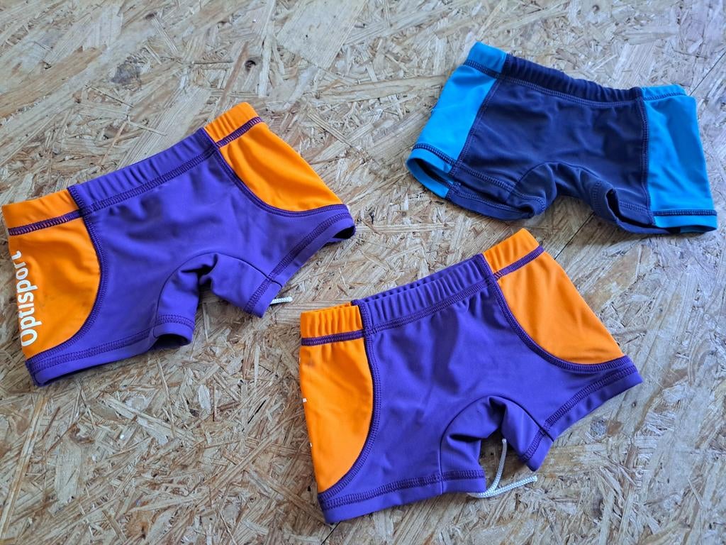 3 zwembroekjes: blauw (XS) en oranje/paars (S), Gebruikt, Jongetje of Meisje, Overige maten, Ophalen of Verzenden