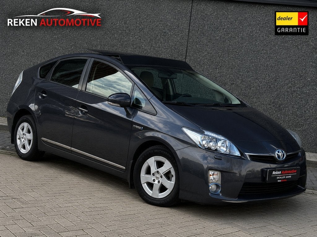 Toyota Prius 1.8 Executive Hybride Aut Solar dak Hud Alcanta, Auto's, Toyota, 1345 kg, Gebruikt, Huisgarantie, 4 cilinders