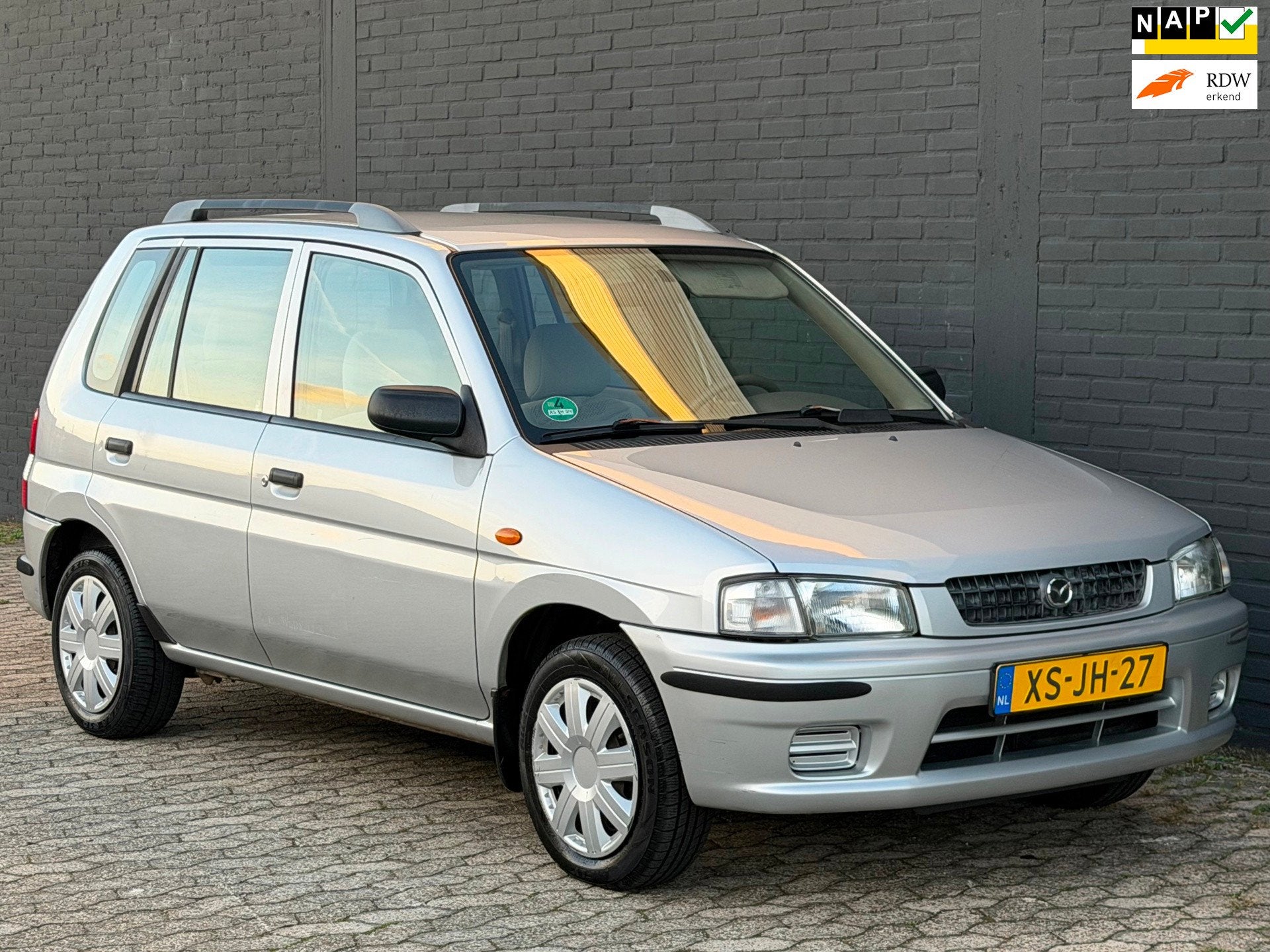 Mazda Demio 1.3 LX APK NAP, 31 €/maand, Bedrijf, Zilver of Grijs, 1324 cc