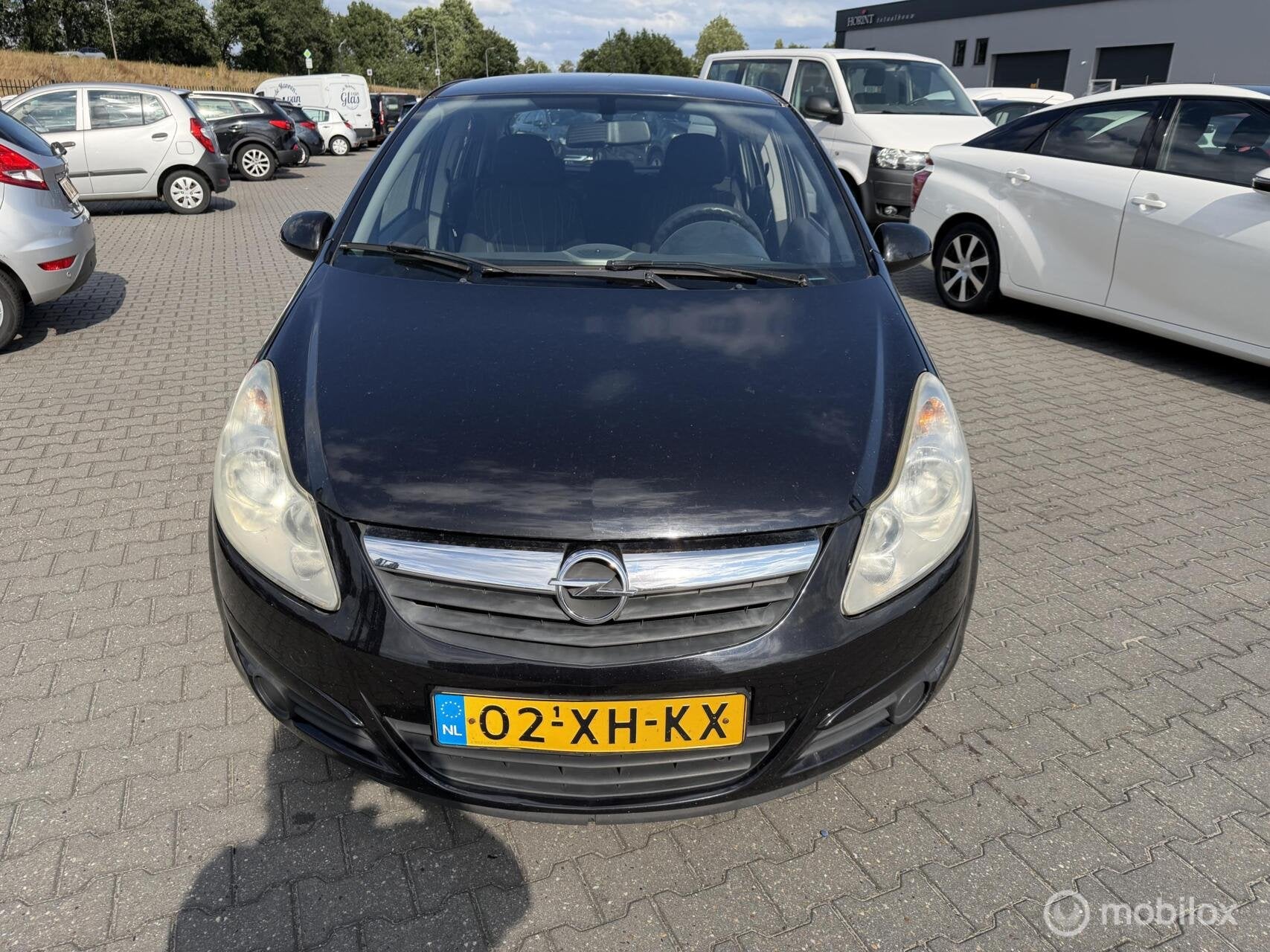 Opel Corsa 1.4-16V Enjoy inruil koopje, Auto's, Voorwielaandrijving, Gebruikt, Zwart, 4 cilinders