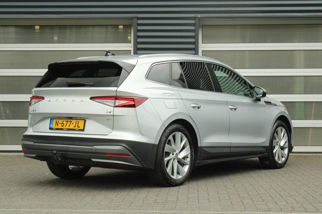 Skoda Enyaq 60 180pk | Stoelverwarming | Trekhaak | Cruise C, Auto's, Automaat, Achterwielaandrijving, Gebruikt, Leder en Stof