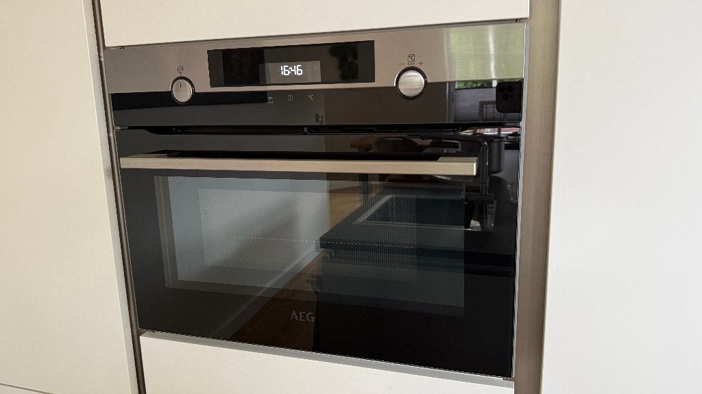 AEG combi oven magnetron 45 cm hoogte KMK565000M, Ophalen, 45 tot 50 cm, Gebruikt, AEG