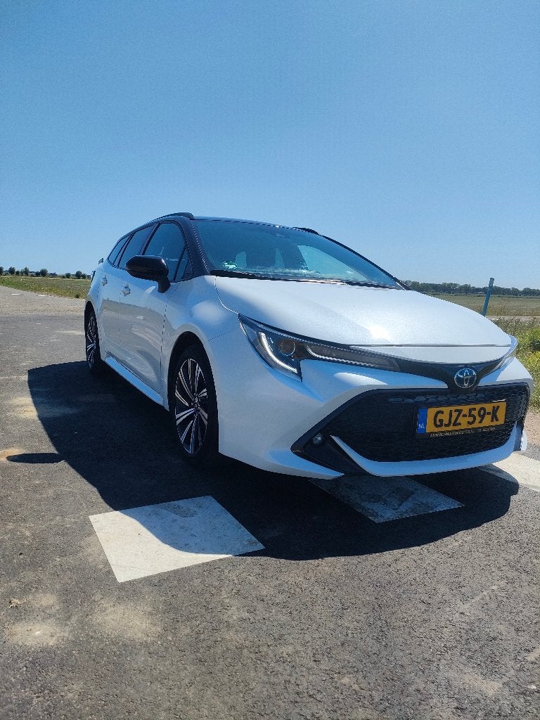 Toyota Corolla Touring sports 1.8 Hybrid 122pk CVT 2022 Wit, 1345 kg, 450 kg, 4 cilinders, Leder en Stof