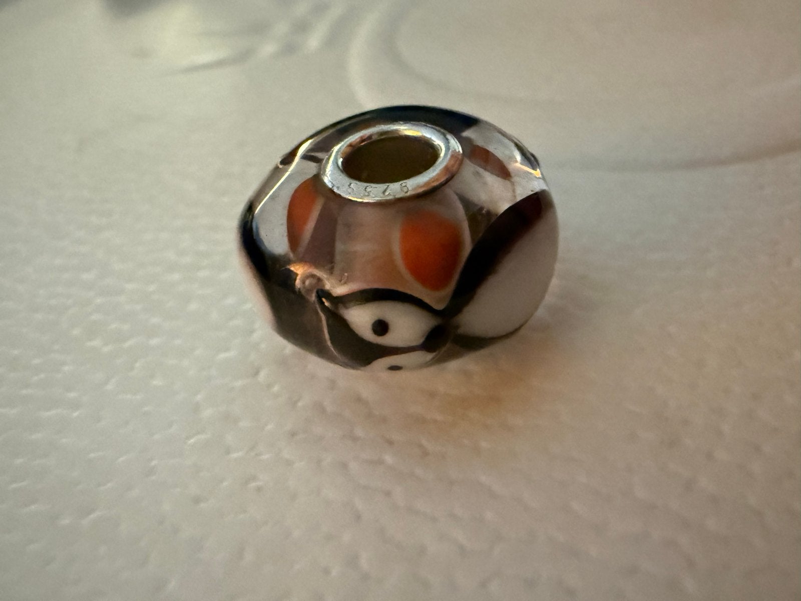 Trollbeads bedel - Glas met oranje en zwarte accenten, Glas of Kristal, Ophalen of Verzenden, Zo goed als nieuw, Trollbeads