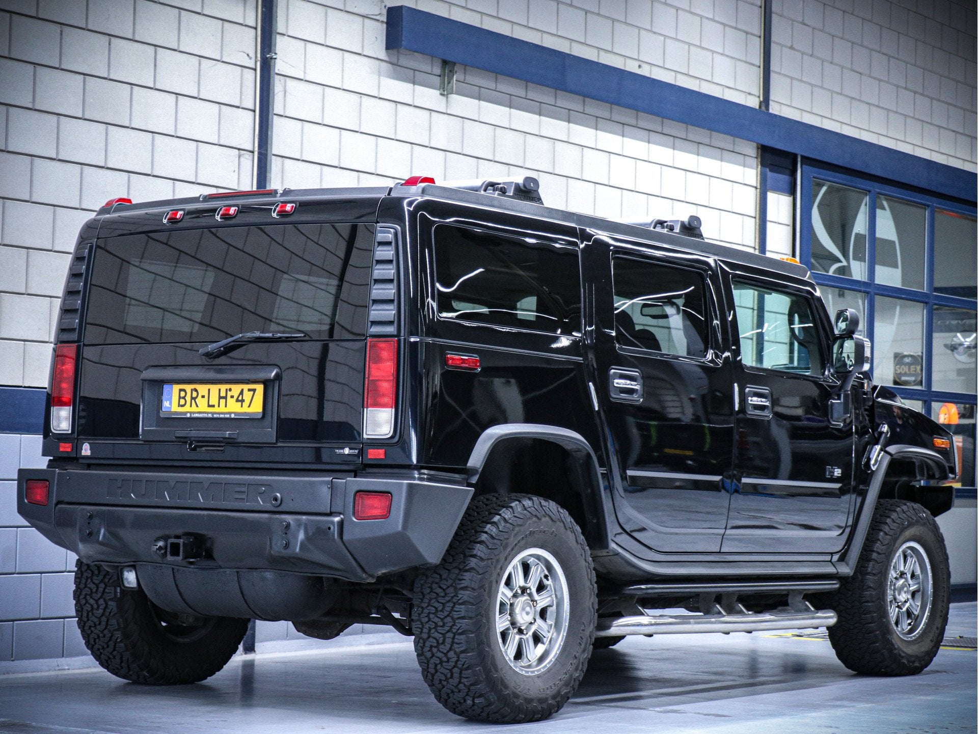 Hummer H2 6.0L V8 | Zwart leder | Schuif Kanteldak | LPG | G, Gebruikt, 324 pk, 2936 kg, Zwart