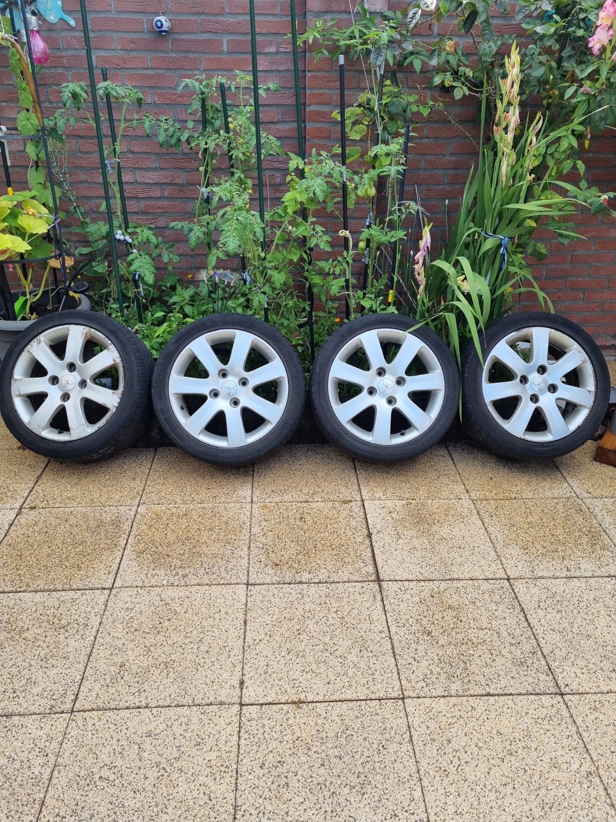 Set van 4 originele Mitsubishi Colt velgen met banden, Ophalen