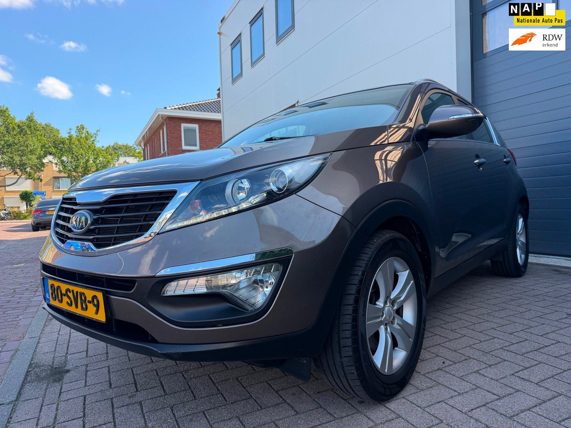 Kia Sportage 2.0 X-ecutive Plus Pack/Automaat/1eigenaar/Deal, Auto's, Kia, Gebruikt, 4 cilinders, Bruin, Leder en Stof
