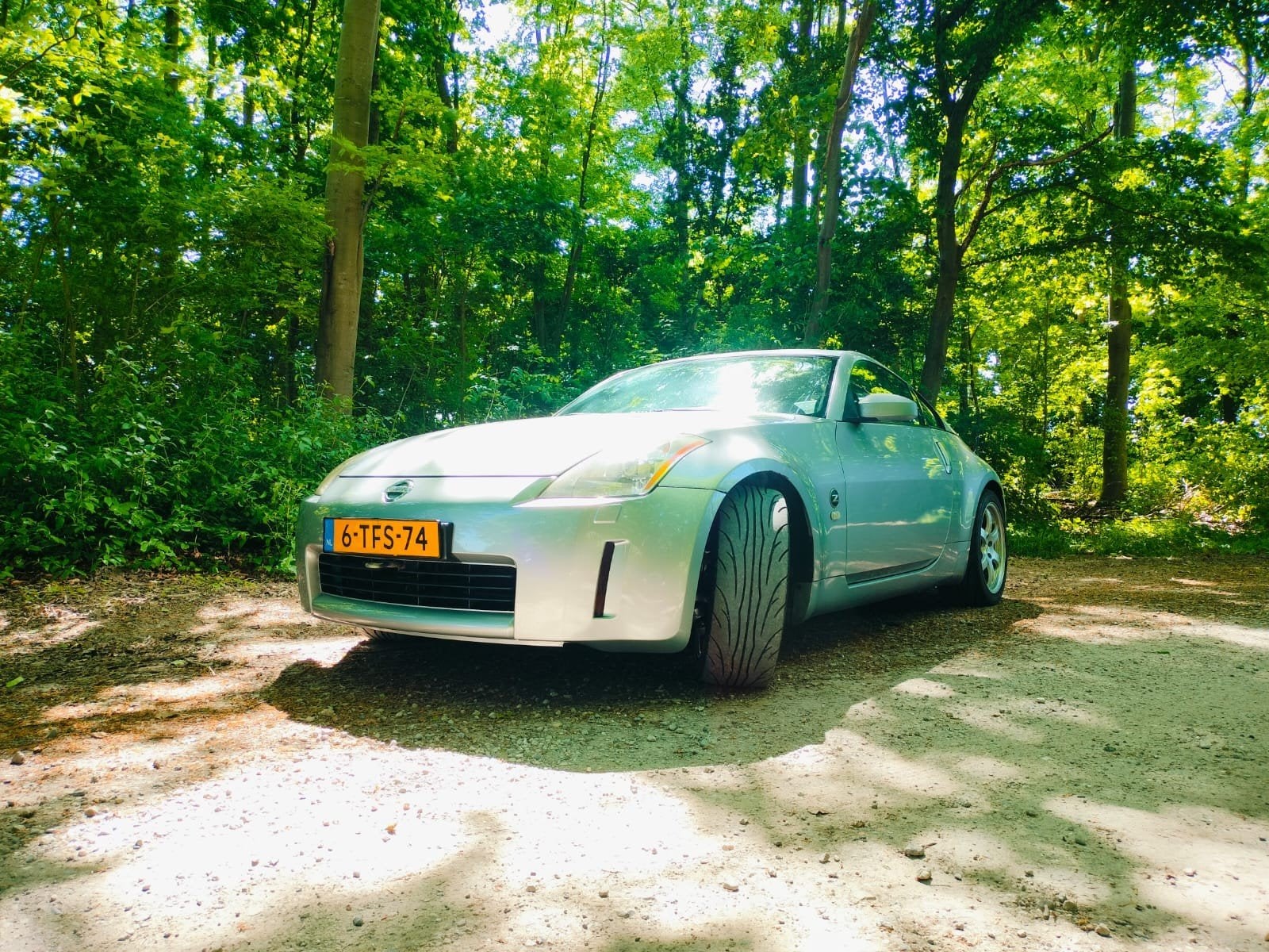 Nissan 350Z bouwjaar 2005, Zilver, Auto's, 350Z, 1442 kg, Achterwielaandrijving, Zwart
