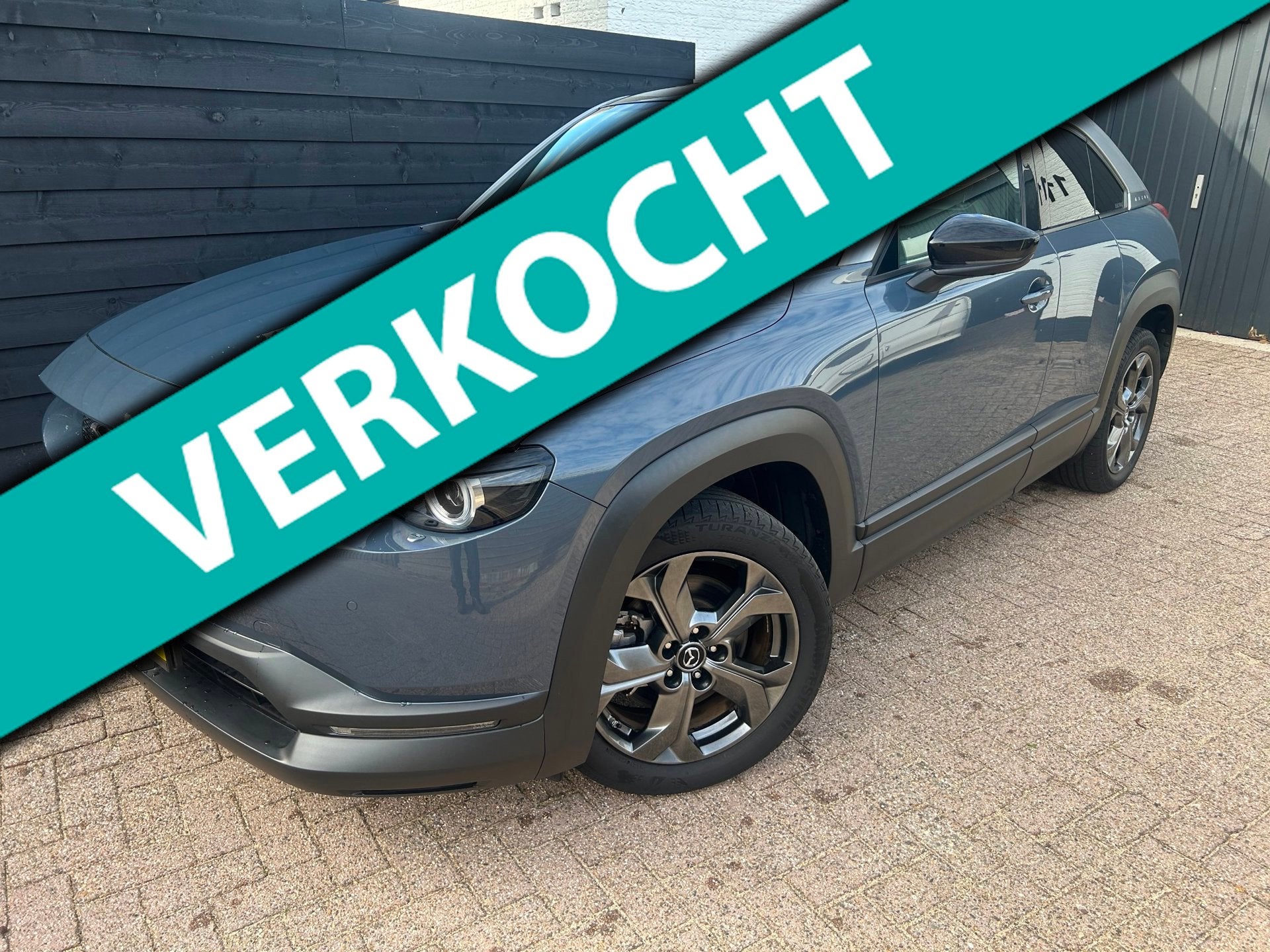 Mazda MX-30 E-SkyActiv 145 Luxury 36 kWh, Schuifdak, Alle Op, Auto's, Gebruikt, Beige, 35 kWh, Leder en Stof