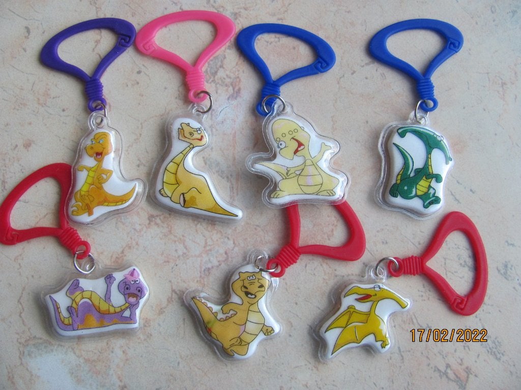 NIEUW 7 x SLEUTELHANGER bagclip DINOSAURUS dino trakteren, Hobby en Vrije tijd, Ophalen of Verzenden, Nieuw, Feestartikel, Verjaardag