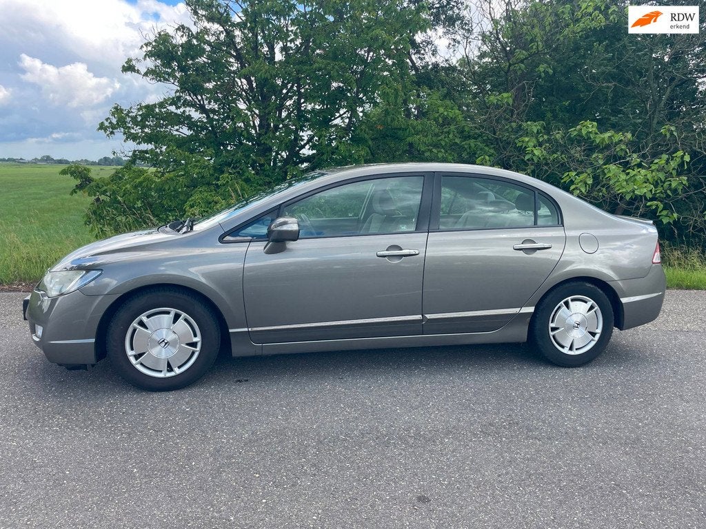 Honda Civic 1.3 Hybrid automaat nette auto., Auto's, Honda, Bedrijf, Te koop, Civic, ABS, Airbags, Airconditioning, Automatische klimaatregeling