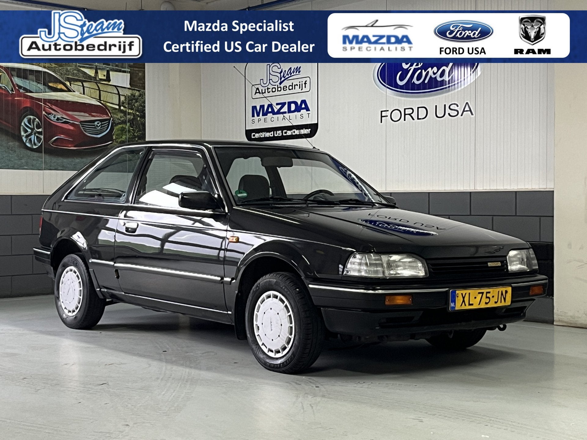 Mazda 323 Hatchback 1.3 Finish Automaat Nieuw in Nederland g, Auto's, Oldtimers, Stof, Beige, 58 pk, Zwart