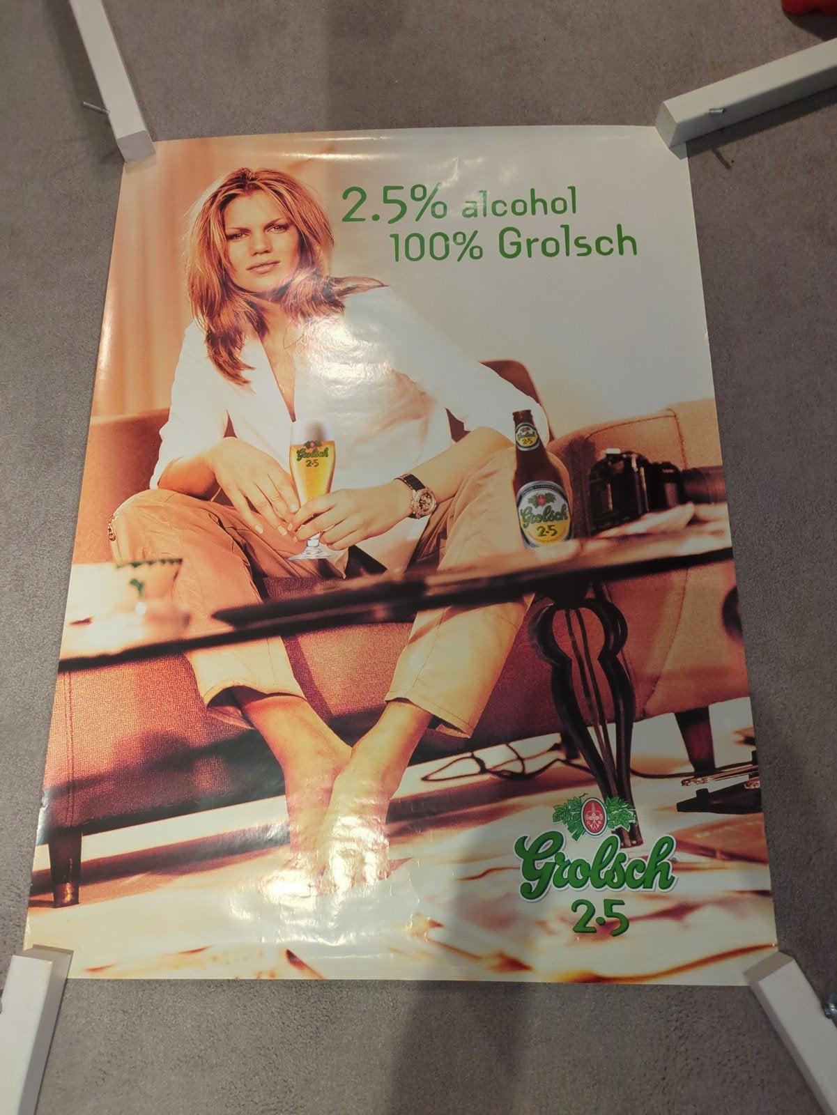 Grolsch 2.5% alcohol reclameposter met model, Ophalen of Verzenden, Zo goed als nieuw, Reclamebord