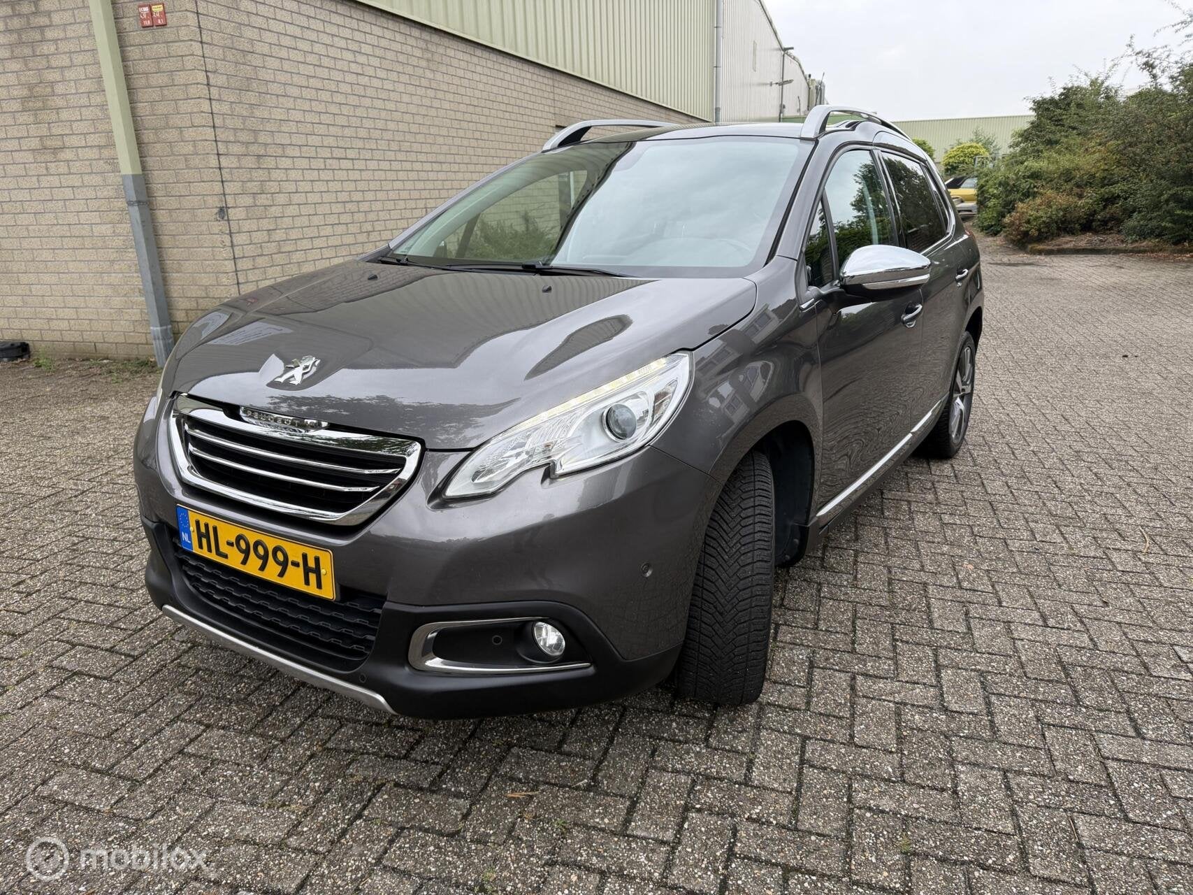 Peugeot 2008 1.2 PureTech Active AUTOMAAT, Auto's, Gebruikt, Euro 6, 1199 cc, Leder en Stof