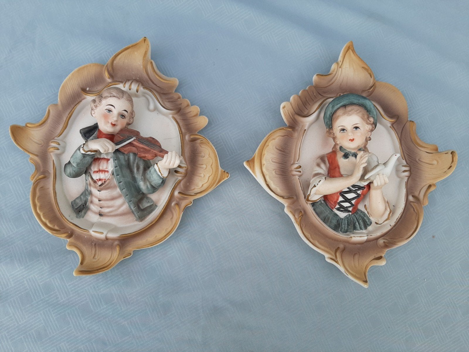 2 wanddecoratie man en vrouw/ relief, Antiek en Kunst, Ophalen of Verzenden