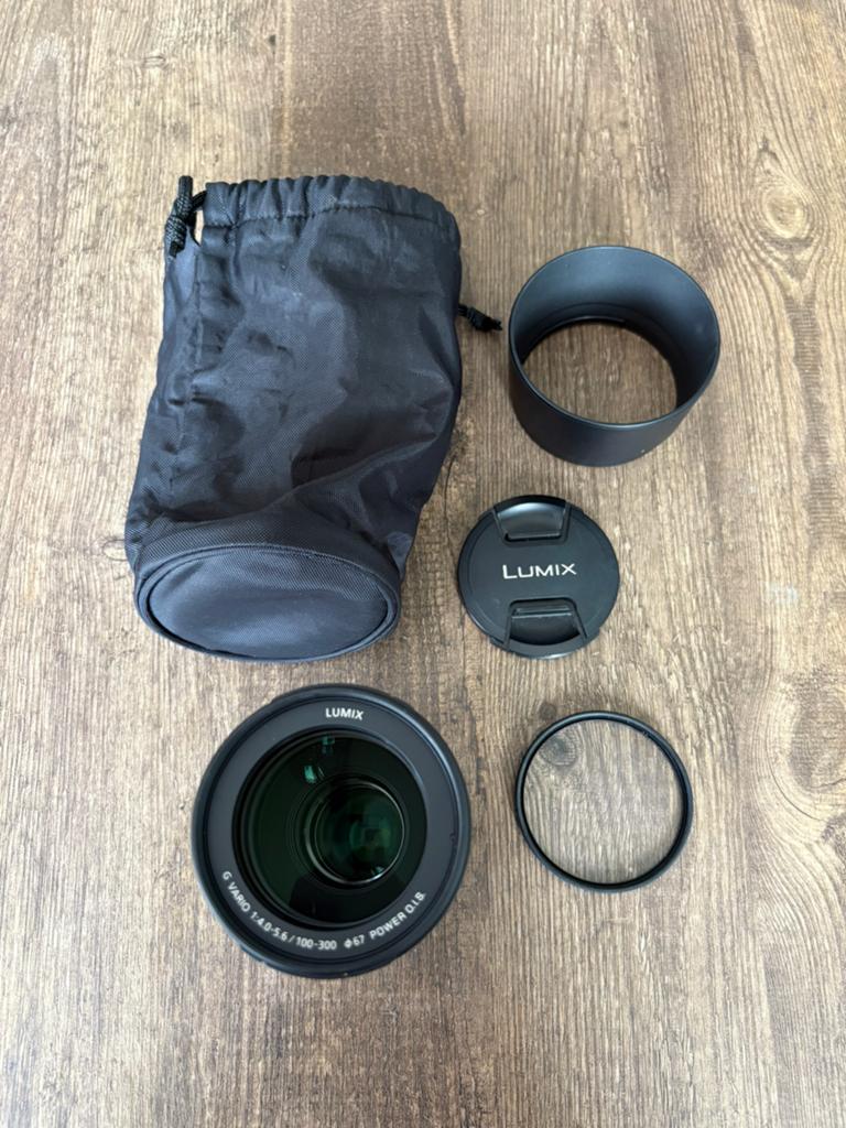 Panasonic lumix lens - 1:4.0-5.6 / 100-300 Power O.I.S., Ophalen of Verzenden, Zo goed als nieuw, Telelens, Zoom