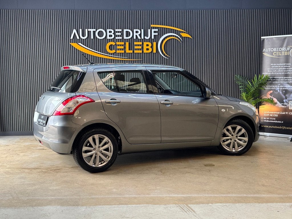 Suzuki Swift 1.2 Comfort 2011 GRIJS AUT|AIRCO|ELEKTRRAMEN, Auto's, Stof, 4 cilinders, 965 kg, Swift