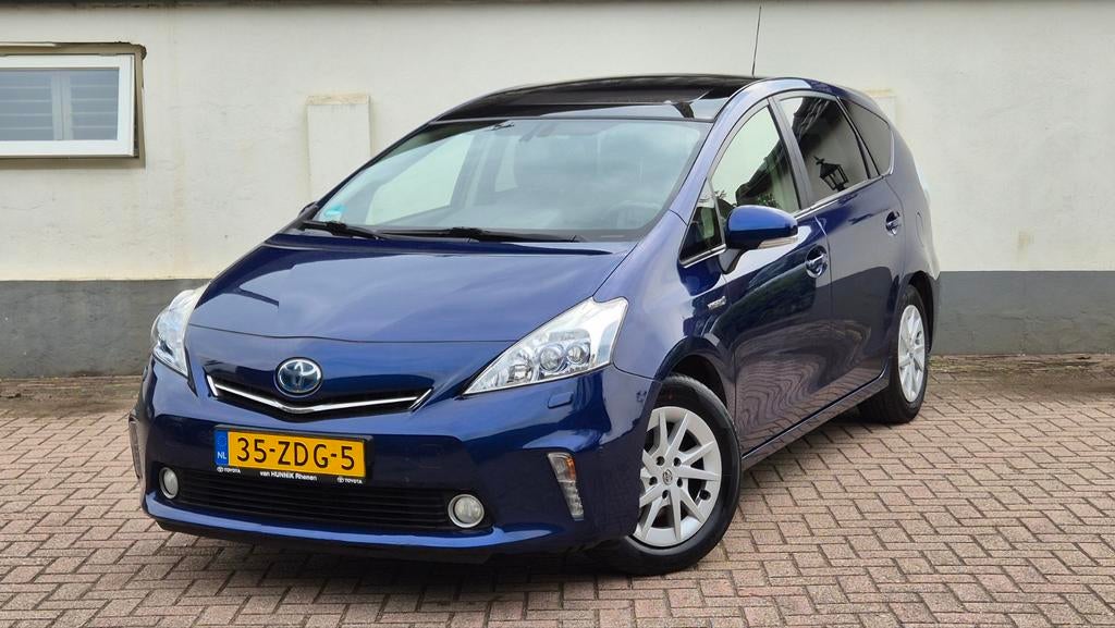 Toyota Prius Wagon 1.8 Full Hybrid 136PKAut.Dynamic Business, Auto's, Toyota, Stof, 4 cilinders, Blauw, 7 stoelen