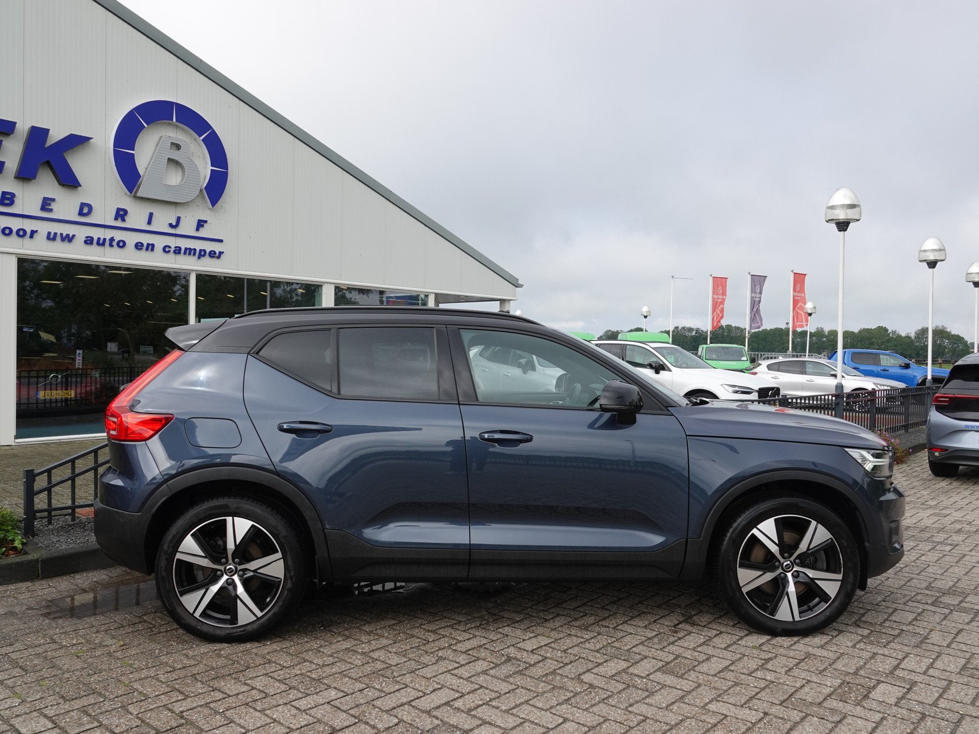 Volvo XC40 1.5 T4 Recharge R-Design VOL LEER | PANODAK | HK-, Auto's, Blauw, Leder, 3 cilinders, 211 pk
