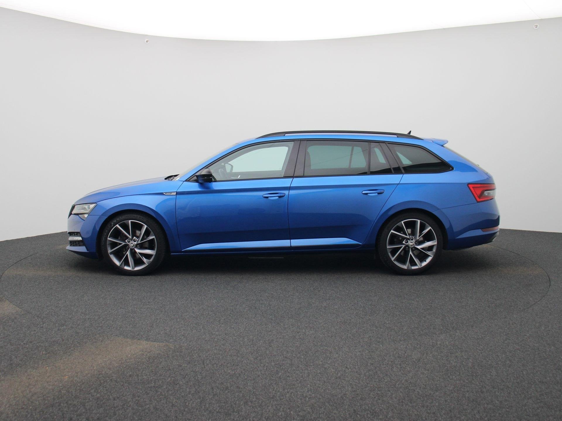 Skoda Superb Combi 1.5 TSI ACT Sportline Business | DIGITAAL, Auto's, 12 maanden, 4 cilinders, Blauw, Alcantara
