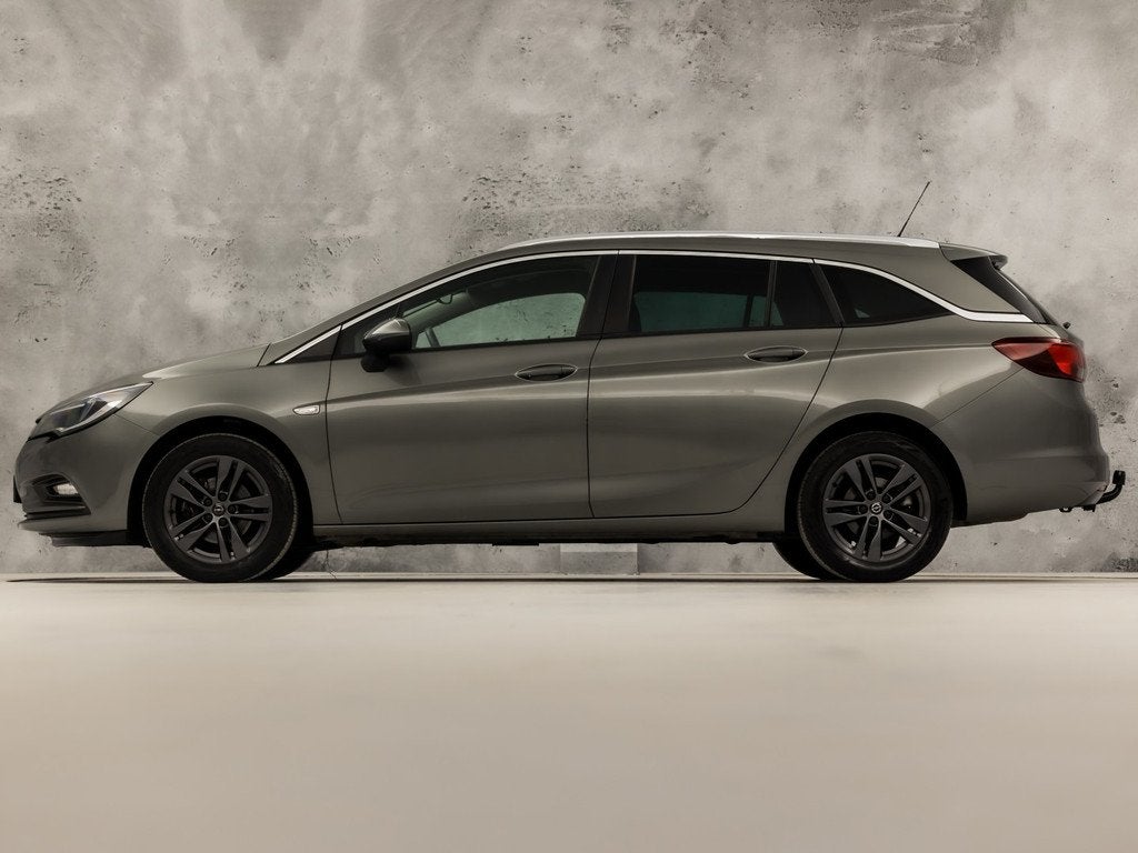 Opel Astra Sports Tourer 1.0 Turbo Sport (APPLE CARPLAY, GRO, Auto's, Opel, Voorwielaandrijving, 12 maanden, Stof, 1178 kg