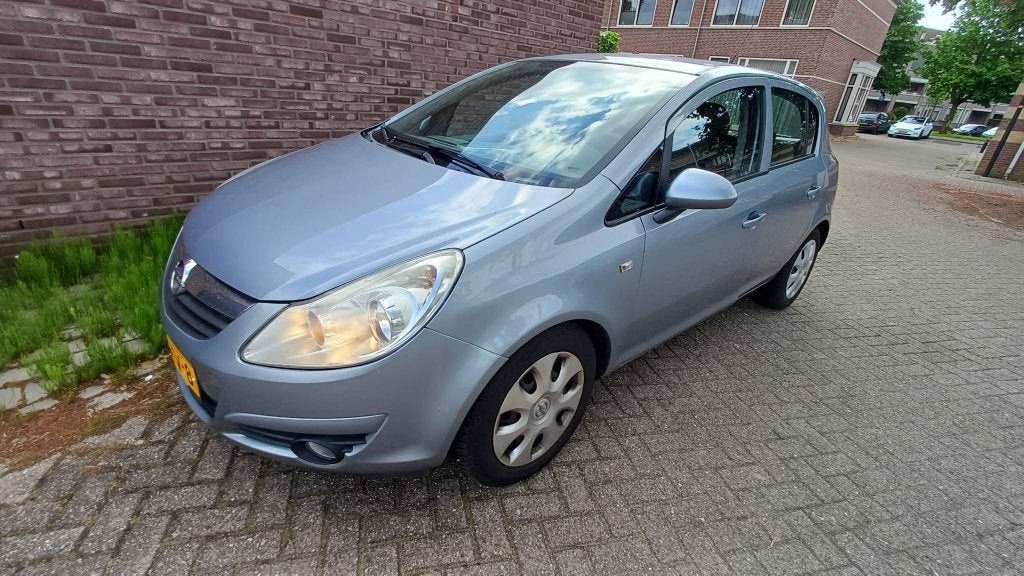 Opel Corsa 1.4 16V 5D AUT 2008 Grijs, Auto's, 4 cilinders, 49 €/maand, Particulier, 1000 kg