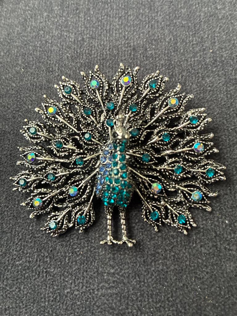 Vintage Pauw Broche met Strass Steentjes - Zilverkleurig, Overige materialen, 4 tot 7 cm, Ophalen of Verzenden, Zo goed als nieuw