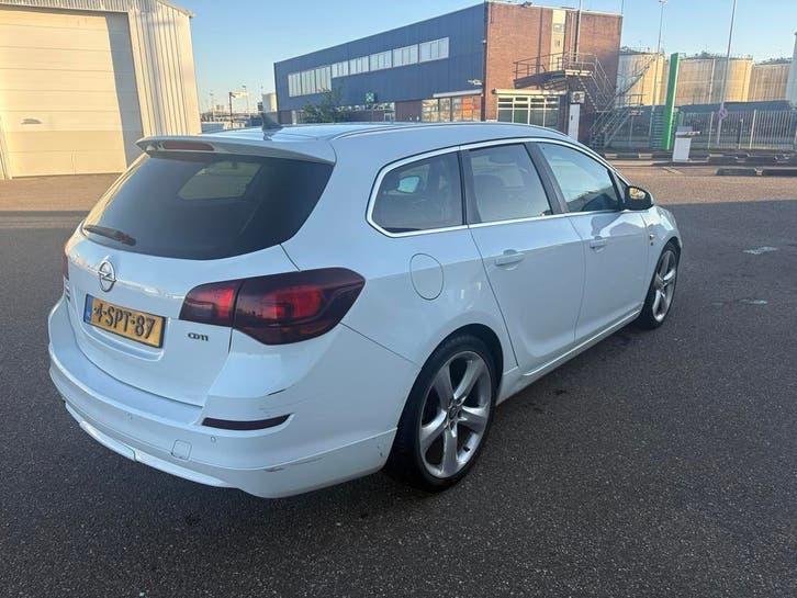 Opel Astra Tourer sport., Auto's, Zwart, Wit, Leder, Stationwagon