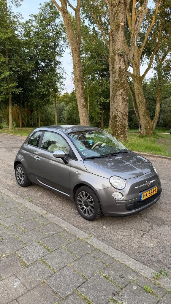 Fiat 500 Pop 1.2 69pk Grijs, Auto's, Fiat, 1242 cc, 4 cilinders, 840 kg, Leder en Stof
