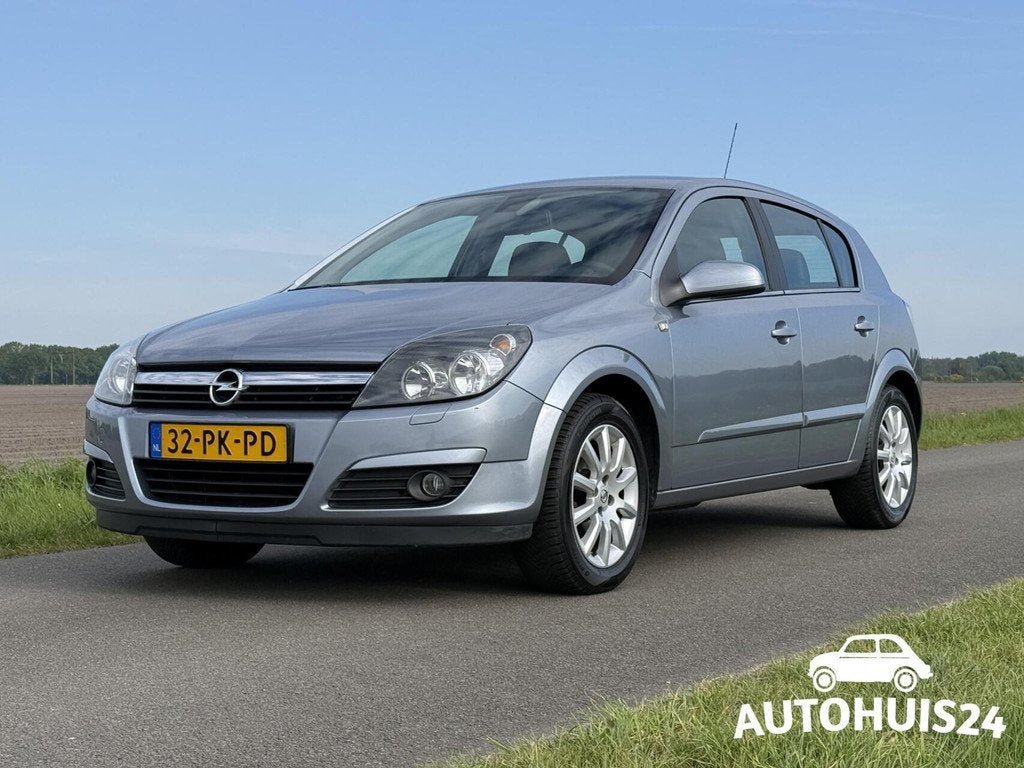 Opel Astra 1.6 Cosmo CLIMA CRUISE LMV APK-02-2027, Voorwielaandrijving, 15 km/l, Zwart, 4 cilinders