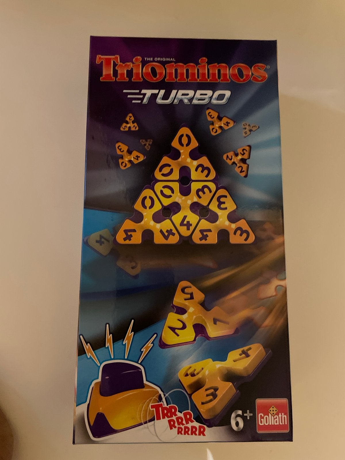 Triominos Turbo - Het originele driehoekige dominospel, Hobby en Vrije tijd, Gezelschapsspellen | Bordspellen, Een of twee spelers