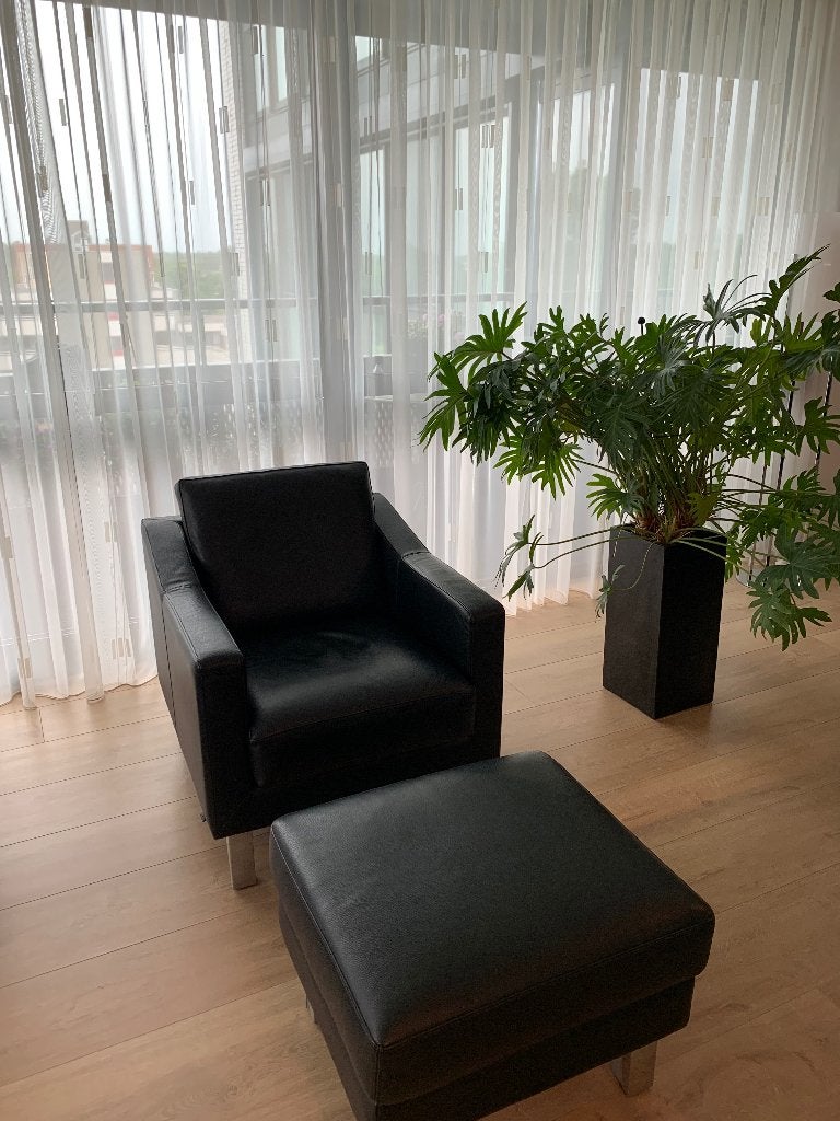 Leolux leren fauteuil en poef, Huis en Inrichting, Ophalen, Gebruikt, 50 tot 75 cm, Leer