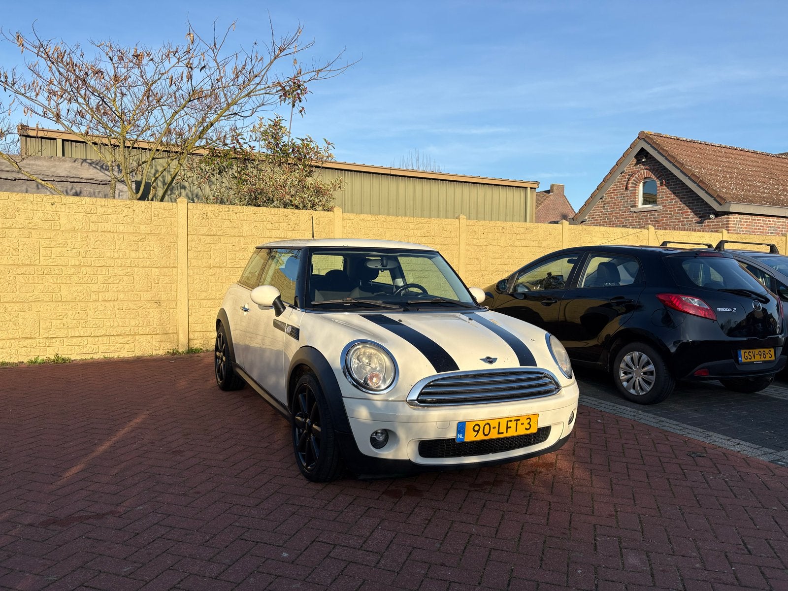 Mini 1.6 ONE 2010 Wit, Auto's, Mini, Voorwielaandrijving, Stof, 40 €/maand, Zwart
