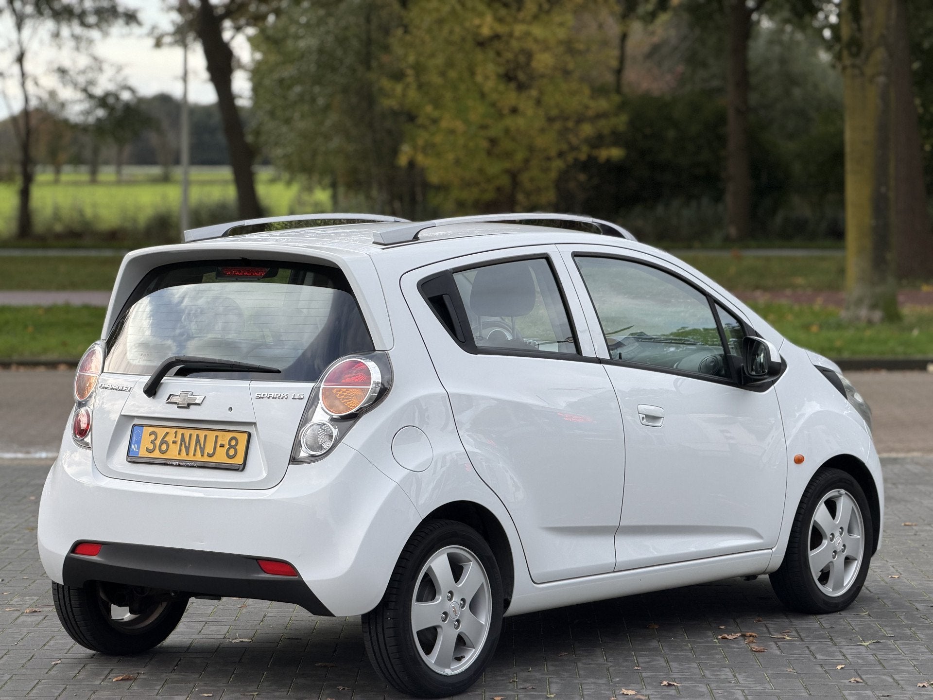 Chevrolet Spark 1.0 16V LS | Airco | LM velgen | 1ste Eigena, Auto's, Voorwielaandrijving, Gebruikt, Zwart, 4 cilinders
