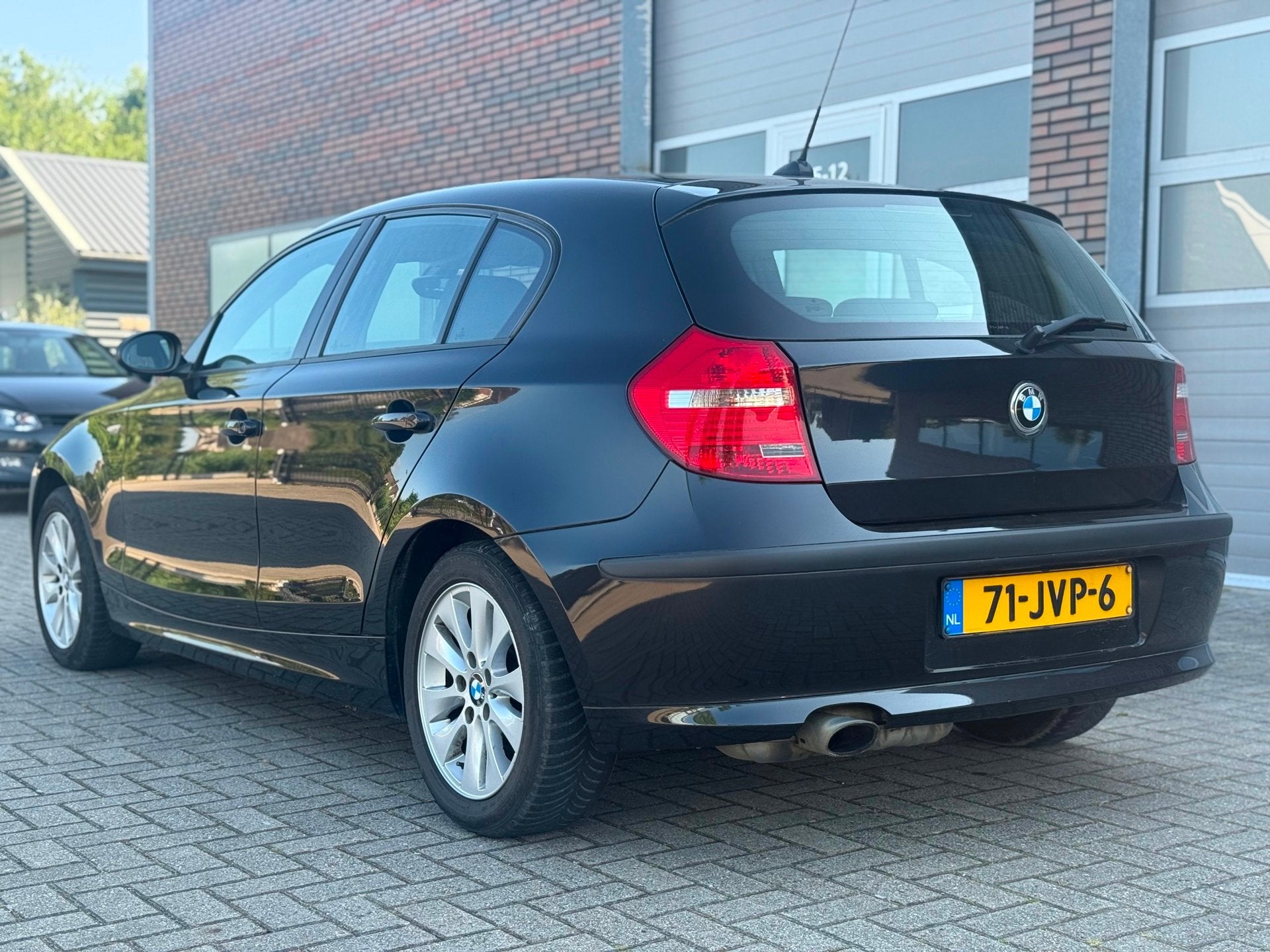 BMW 1-serie 116i Business Line Airco Cruise Elekpakket Nap, Auto's, BMW, 1-Serie, Achterwielaandrijving, 4 cilinders, 4 stoelen