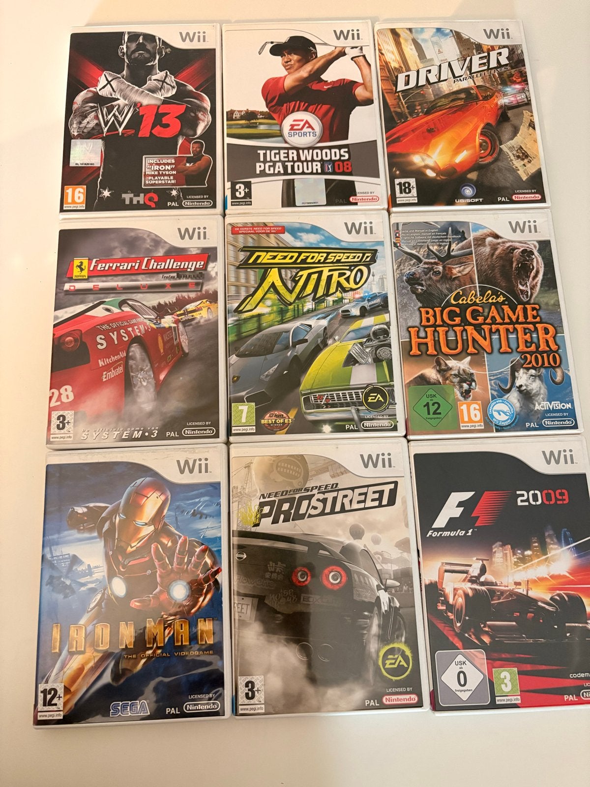 Wii games: WWE, Ferrari, Need for Speed, Iron Man, F1, Gebruikt, 1 speler, Racen en Vliegen, Ophalen of Verzenden
