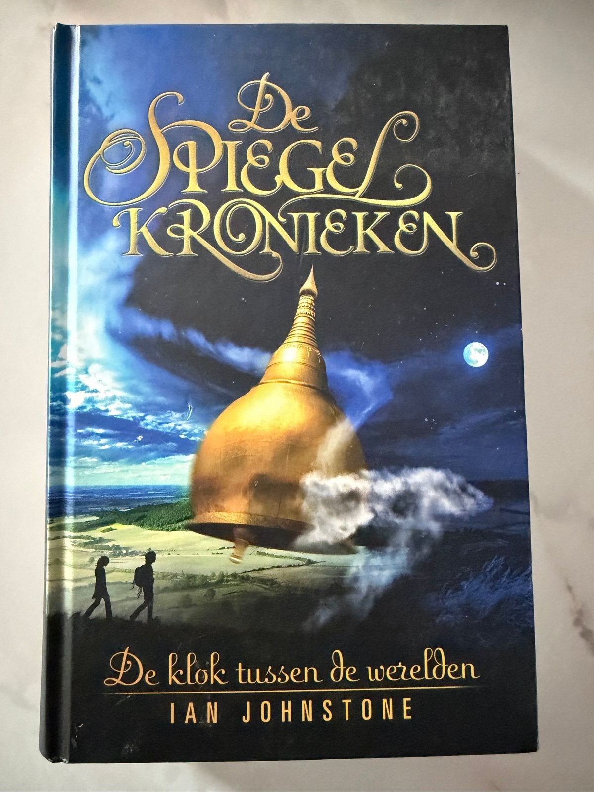 De Spiegelkronieken: De klok tussen de werelden