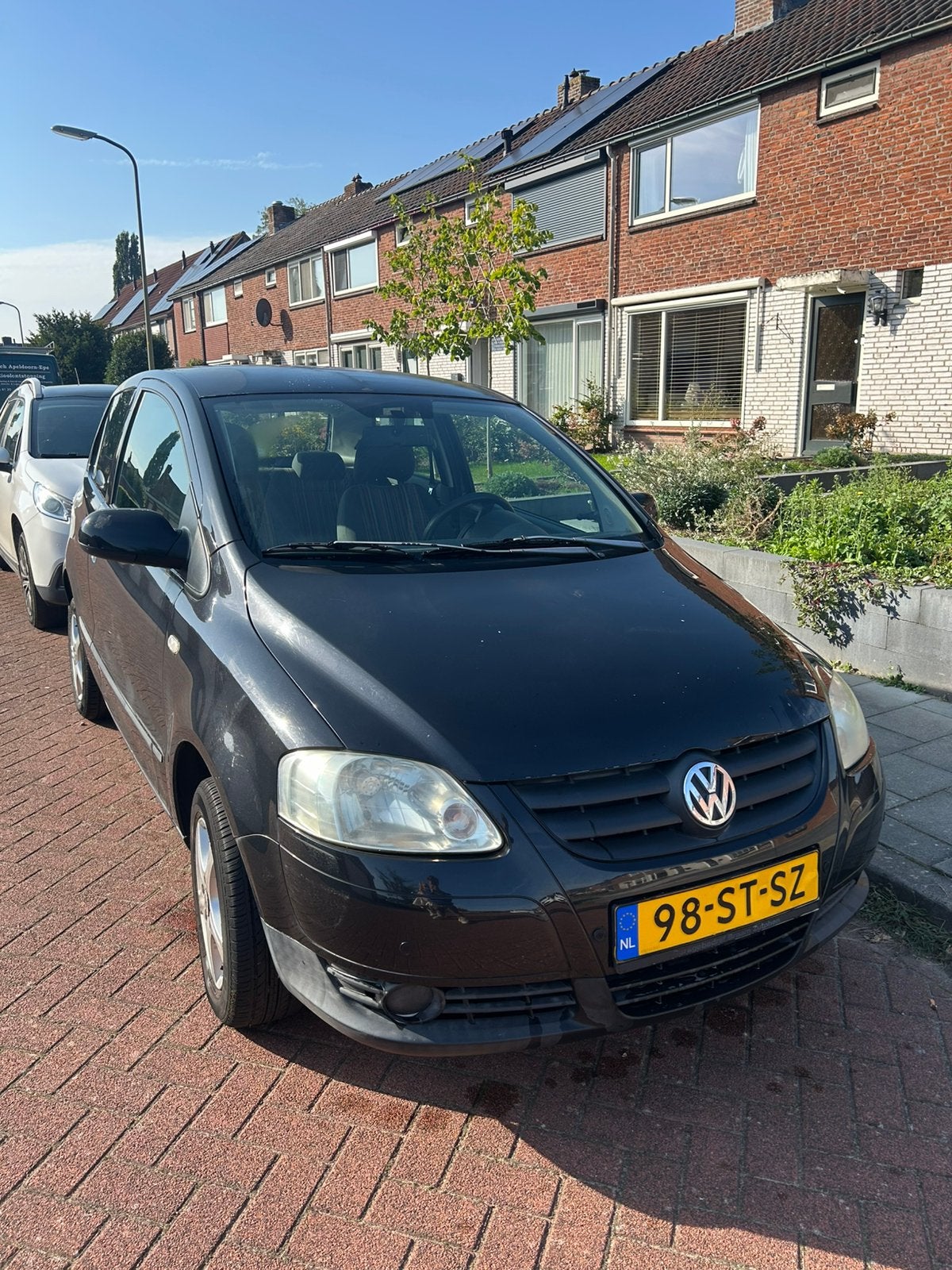 Volkswagen Fox 1.4 55KW 2006 Zwart, Auto's, Voorwielaandrijving, 15 km/l, 4 cilinders, 4 stoelen