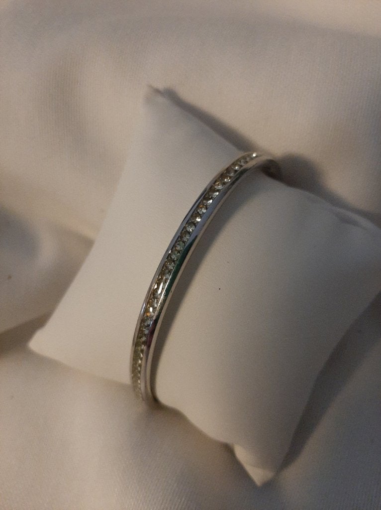 Melano armband met zilverkleurige zirkonia's, Sieraden, Tassen en Uiterlijk, Met kristal, Staal, Nieuw, Ophalen of Verzenden