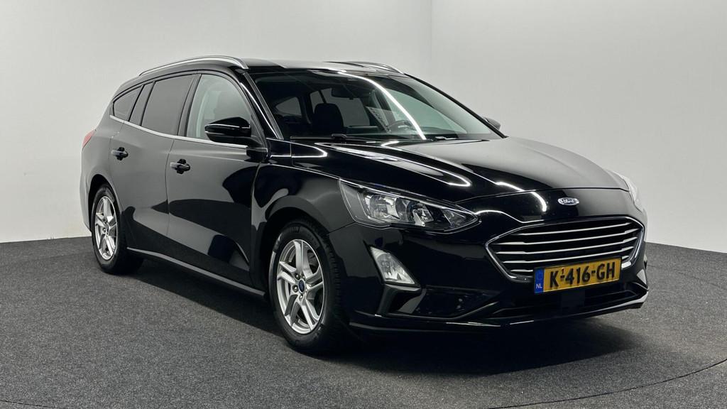 Ford Focus Wagon 1.0 EcoBoost Trend Edition Business TREKHAA, Gebruikt, Met garantie (alle), 1283 kg, Zwart