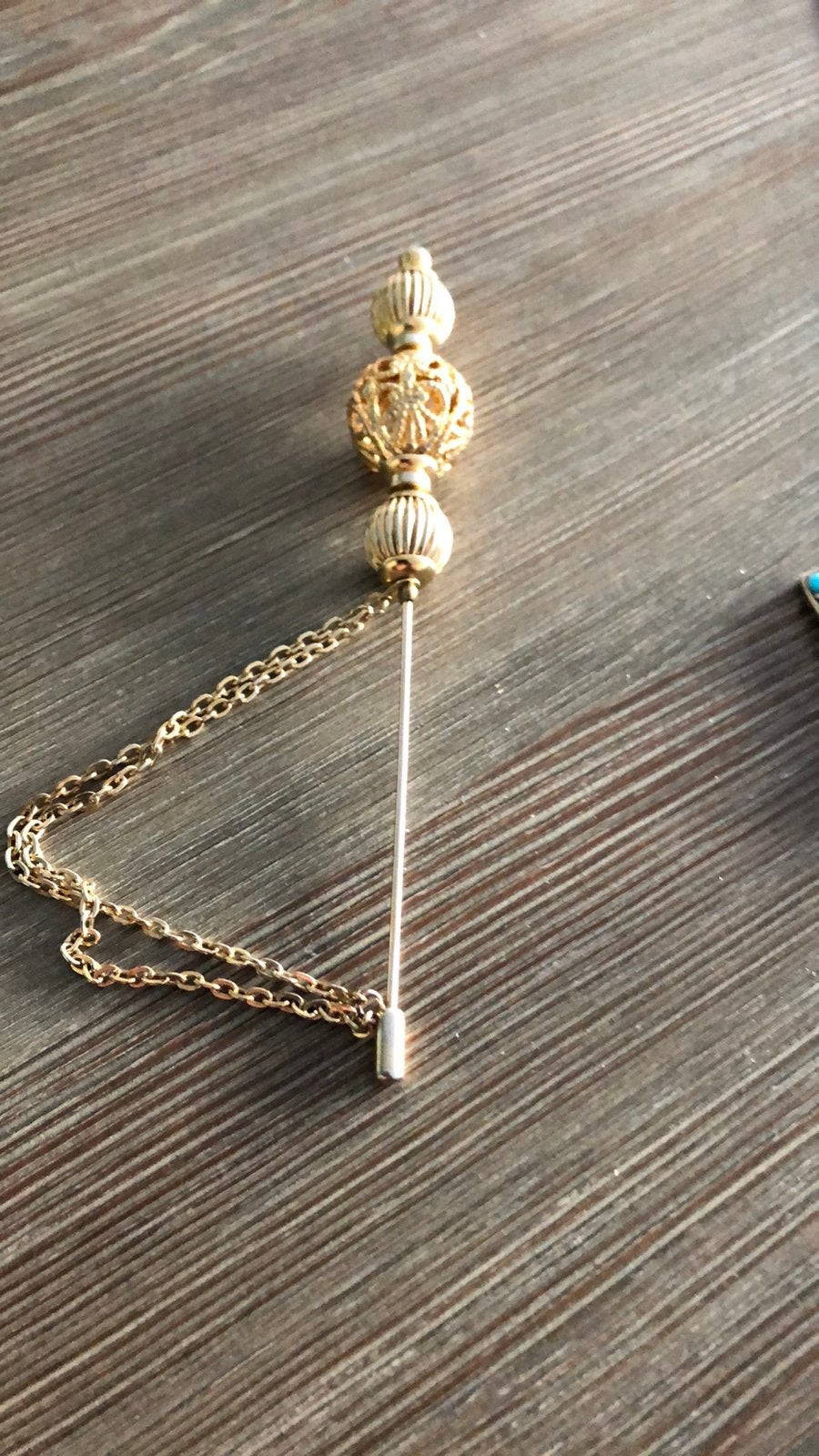 Hoedenspeld/broche, Ophalen of Verzenden, Zo goed als nieuw, Goud, Overige materialen