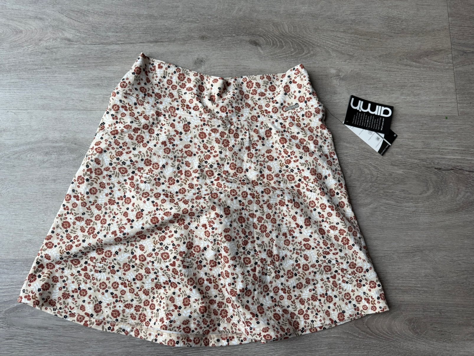 Nieuw tennis rokje van het merk Aimn met bloemen motief, Beige, Nieuw, Ophalen of Verzenden, Racketsport