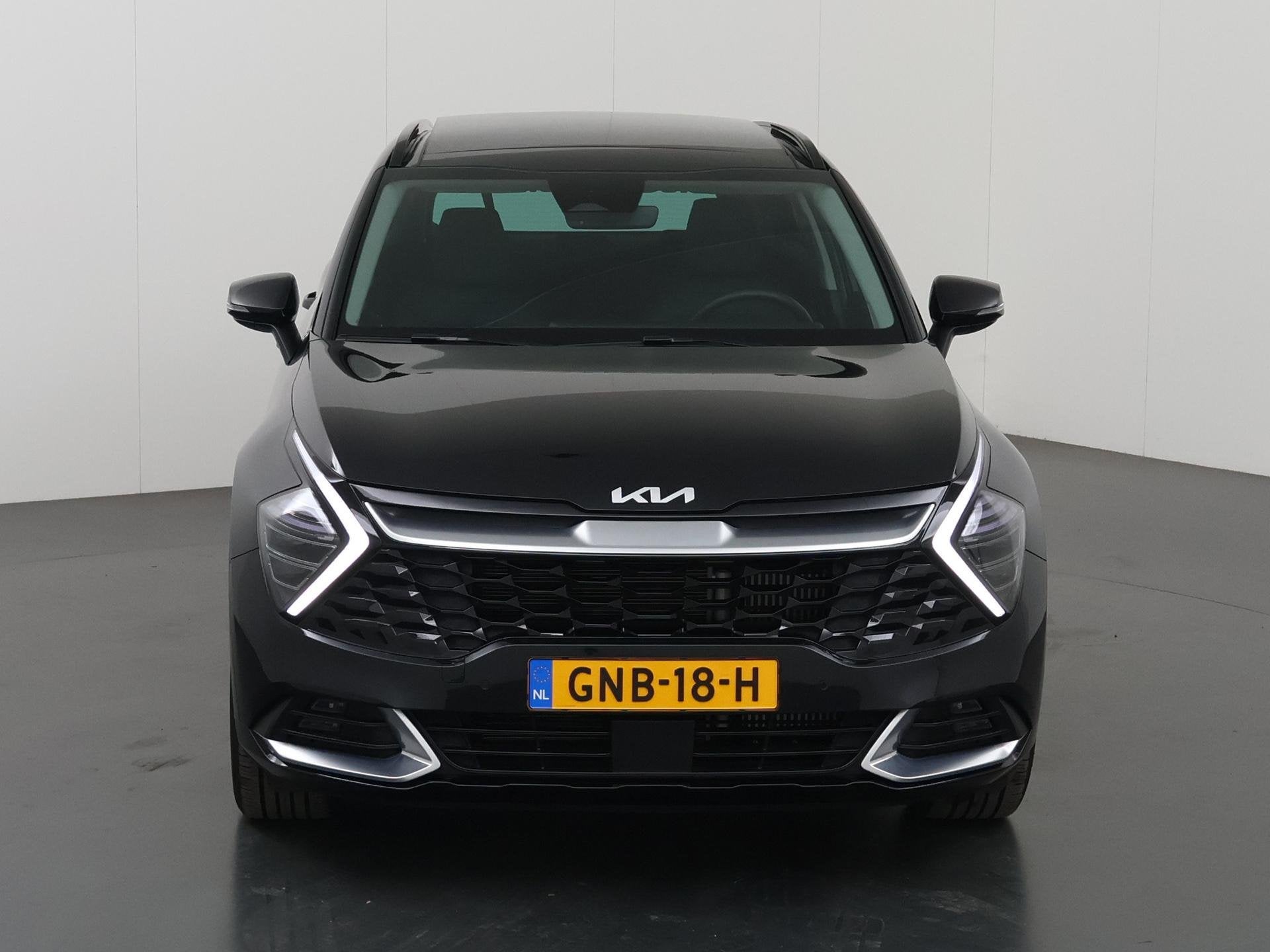 Kia Sportage 1.6 T-GDi MHEV DCT7 DynamicPlusLine | Panoramad, Auto's, Gebruikt, 4 cilinders, Leder en Stof, Zwart